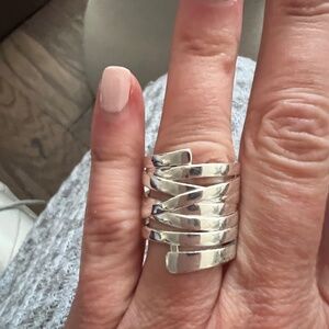 Silver tone wide ring in size 7
